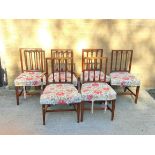 Set of fourteen mahogany dining chairs, comprising of twelve side chairs with a pair of carvers,