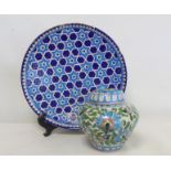 Iznik pottery circular plate with flowerhead star lattice decoration in turquoise and royal blue,