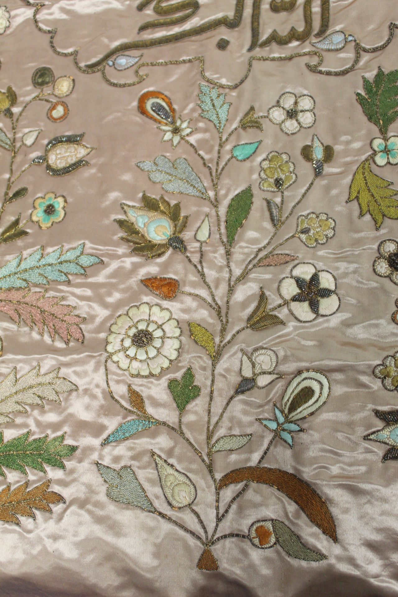 19th or early 20th century Persian embroidered silk panel, the pale pink ground with central panel - Image 7 of 9