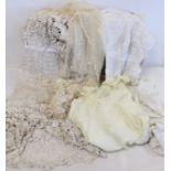 Two Victorian or Edwardian lace and broderie anglaise lady's dresses; a lace and net shawl and a