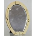 Late 19th/early 20th century dressing table mirror with ivory frame in the form of a horseshoe,
