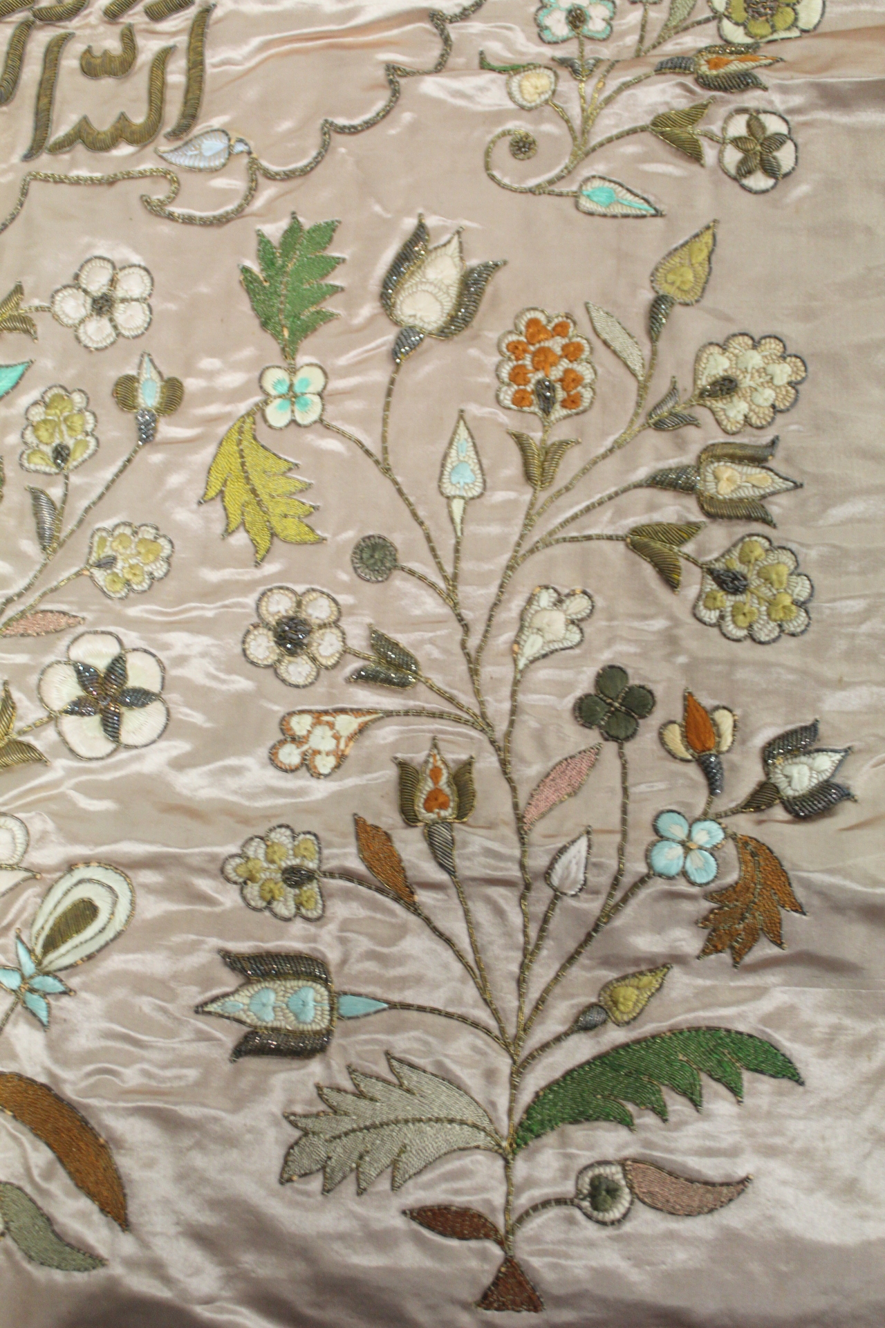 19th or early 20th century Persian embroidered silk panel, the pale pink ground with central panel - Image 8 of 9