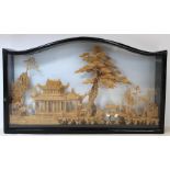 Chinese carved cork diorama depicting a pavilion on a lake with trees and cranes, contained in
