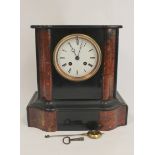 French rouge and black marble mantel clock with shaped moulded sides and flat top. 16.5cm.