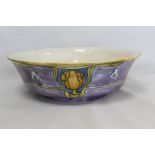 Large Minton Secessionist wash bowl with stylised floral panels in lavender, yellow, ochre and blue,