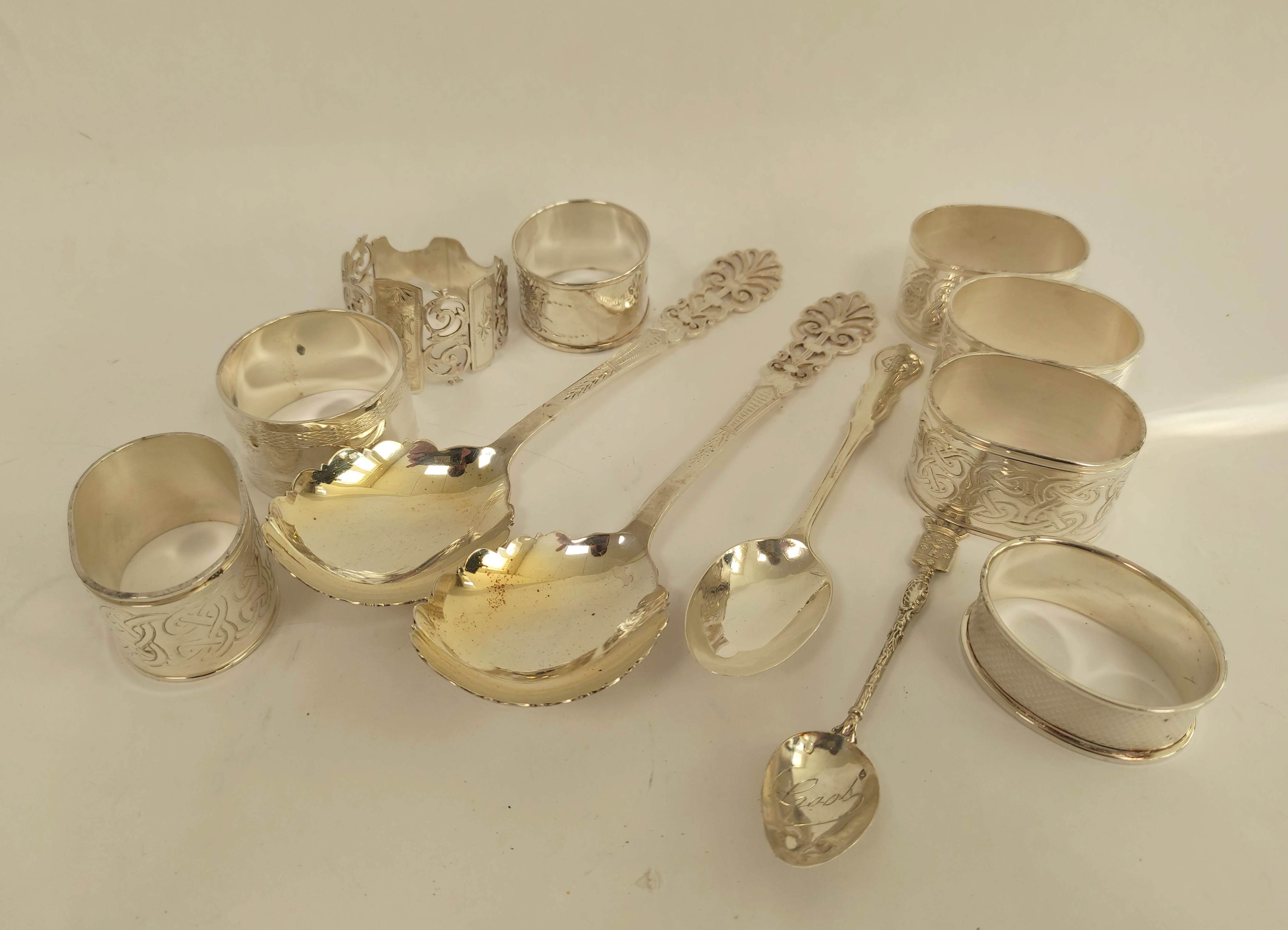 Pair of silver salad servers with engraved pierced terminals, Sheffield 1901, various silver and