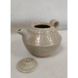 Antique Chinese Celadon ware lidded teapot with crackle glaze in the Song style. H10cm