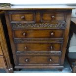 Jacobean style oak chest of drawers by Titchmarsh & Goodwin of Suffolk, with two small drawers above