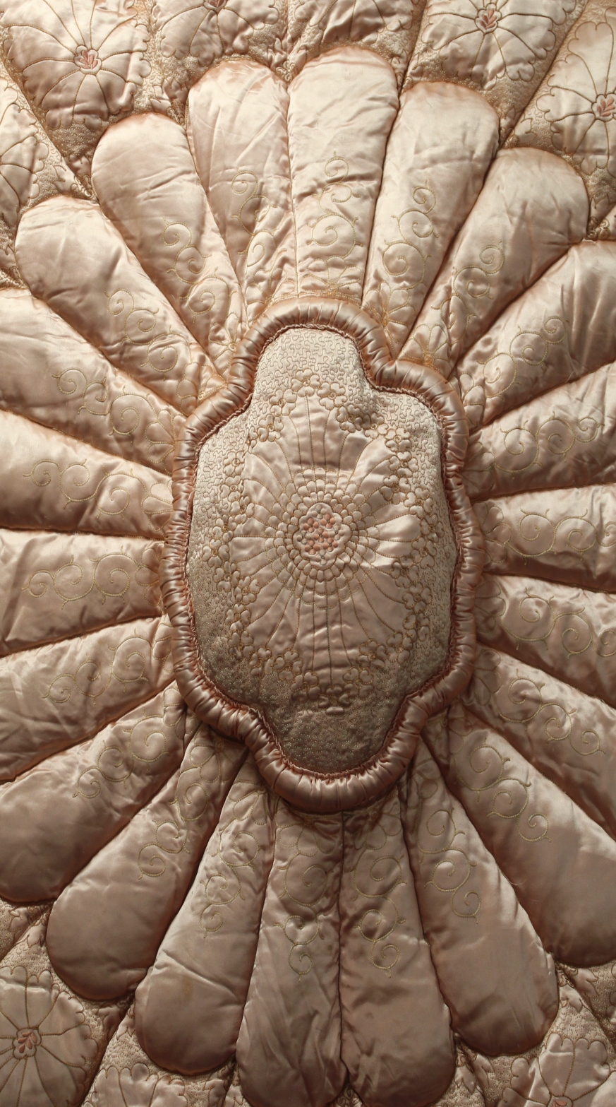 Early 20th century eiderdown of peach satin quilted and embroidered decoration, cotton backed, - Image 2 of 7