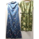 Two vintage Chinese silk brocade dresses, one sage green woven with chrysanthemum of belted