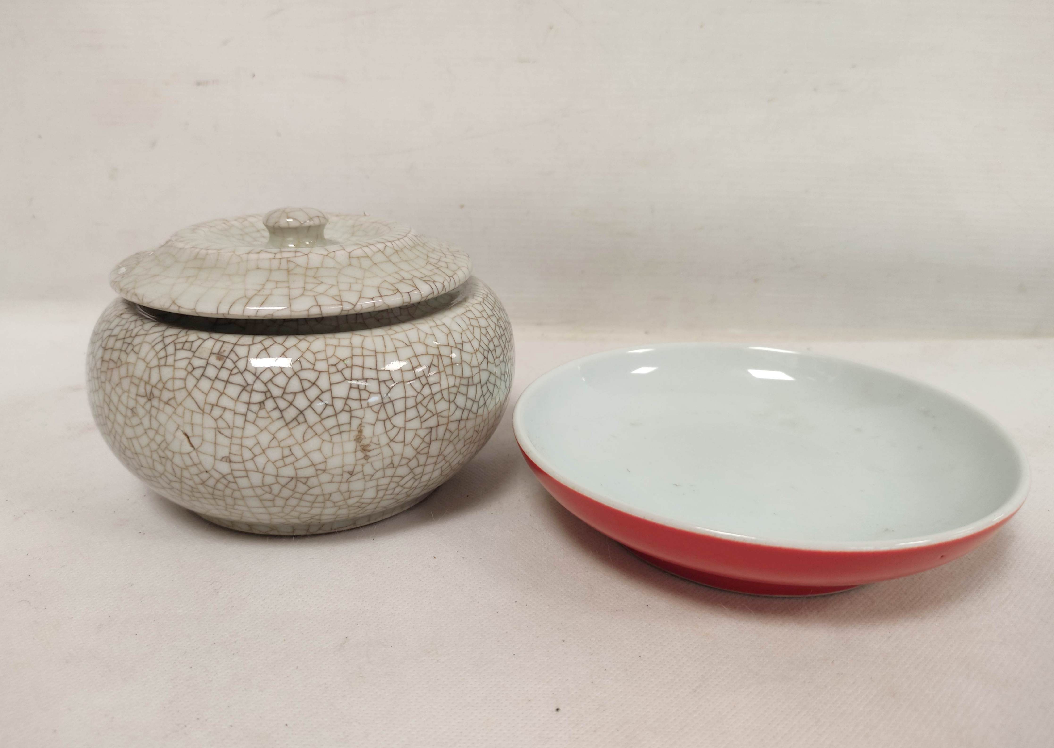 19th century Chinese grey porcelain crackle ware bowl and cover, 10cm high and a red glazed saucer