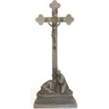 19th or early 20th century pewter altar cross with Christ figure and two figures weeping at foot, on