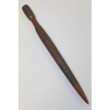 Maori weaving peg (Turuturu) of typical tapered form with slender knop terminal and intricately