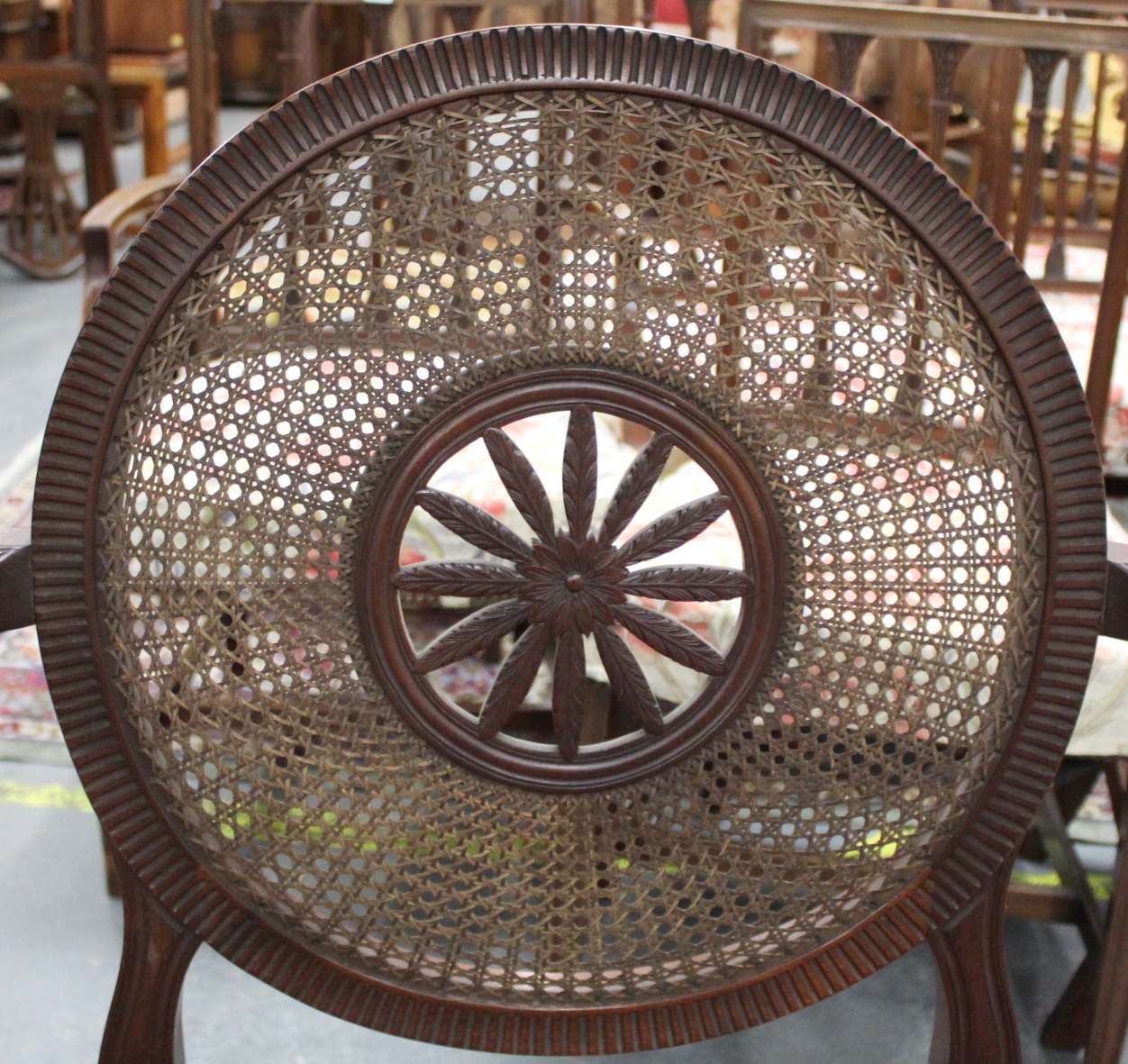 A pair of Sheraton revival mahogany open elbow chairs, the bergere caned circular backs with central - Image 16 of 20