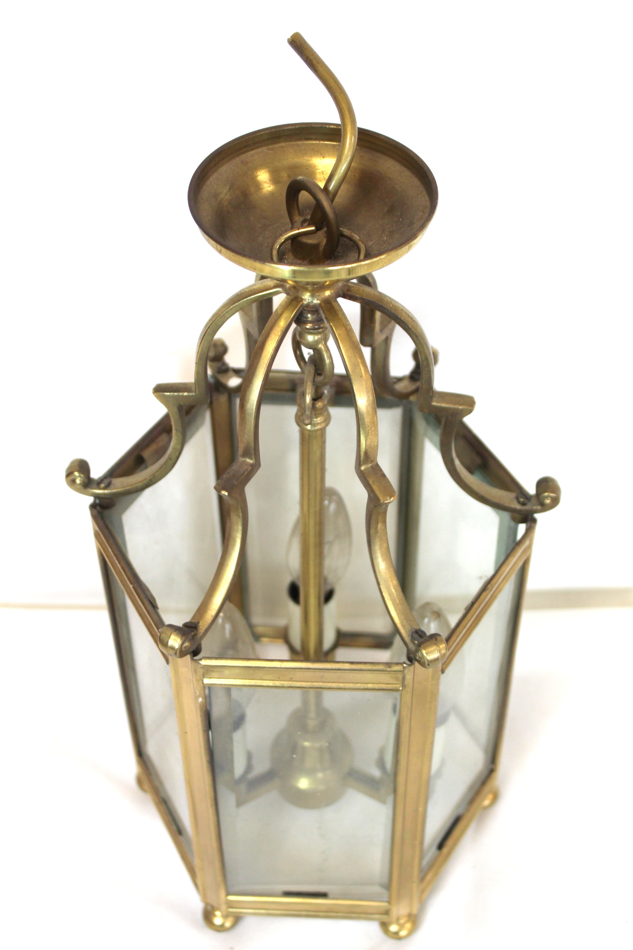 Georgian style brass hall lantern of hexagonal form with bevelled glass panels, domed scroll - Image 4 of 4