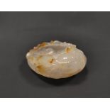 Chinese agate brush washer in the form of a crenulated shell with goldfish to the side, 10.5cm long.