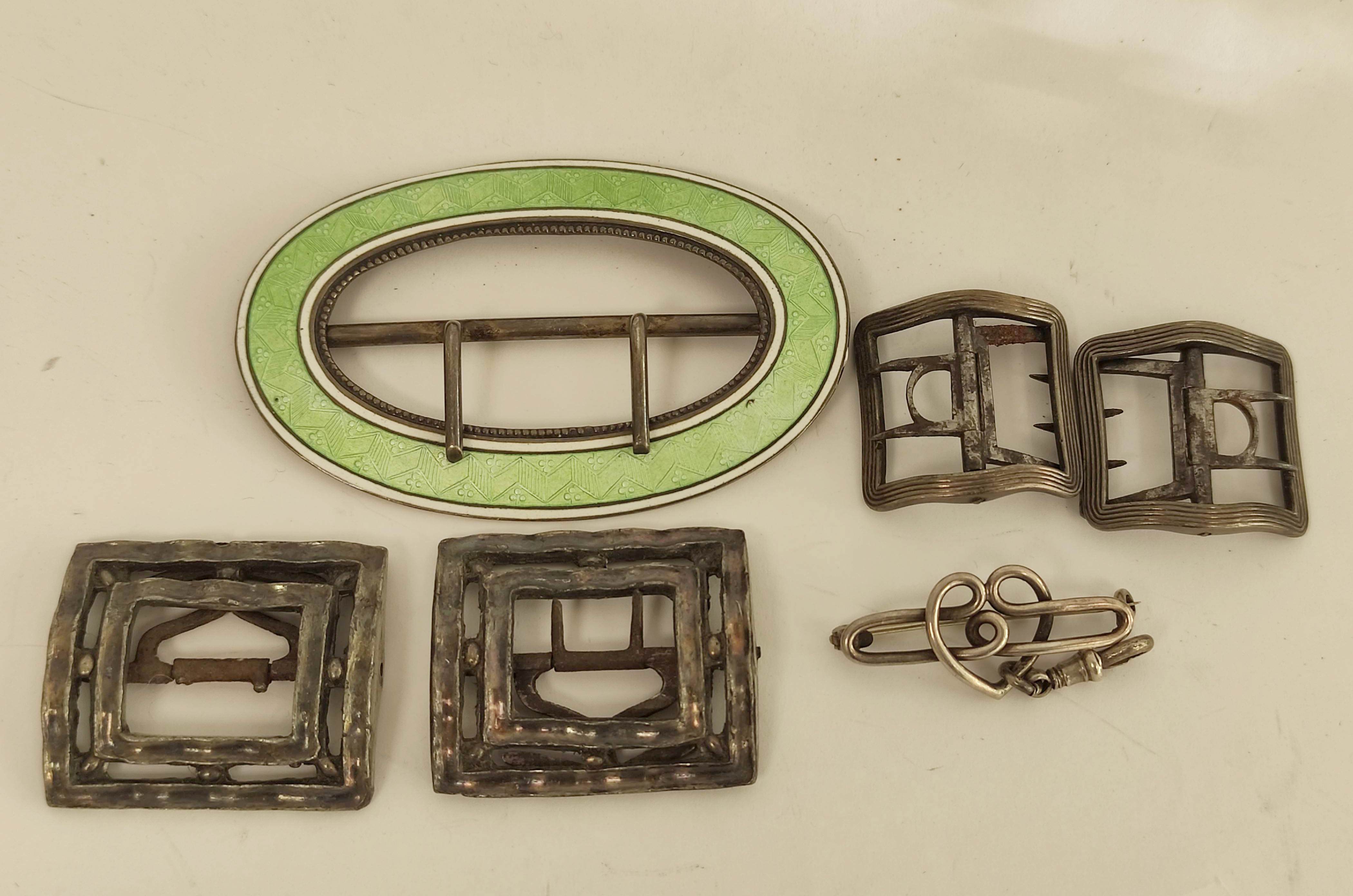 Pair of Georgian silver child's shoe buckles, C.1790, three others and a silver pin brooch.