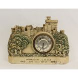 Timepiece in composition case modelled as Windsor Castle 'Time well spent 1910-1935'.