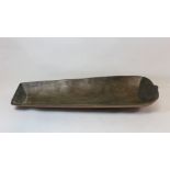 Melanesian carved hardwood offering bowl of shallow boat form, 53cm long.