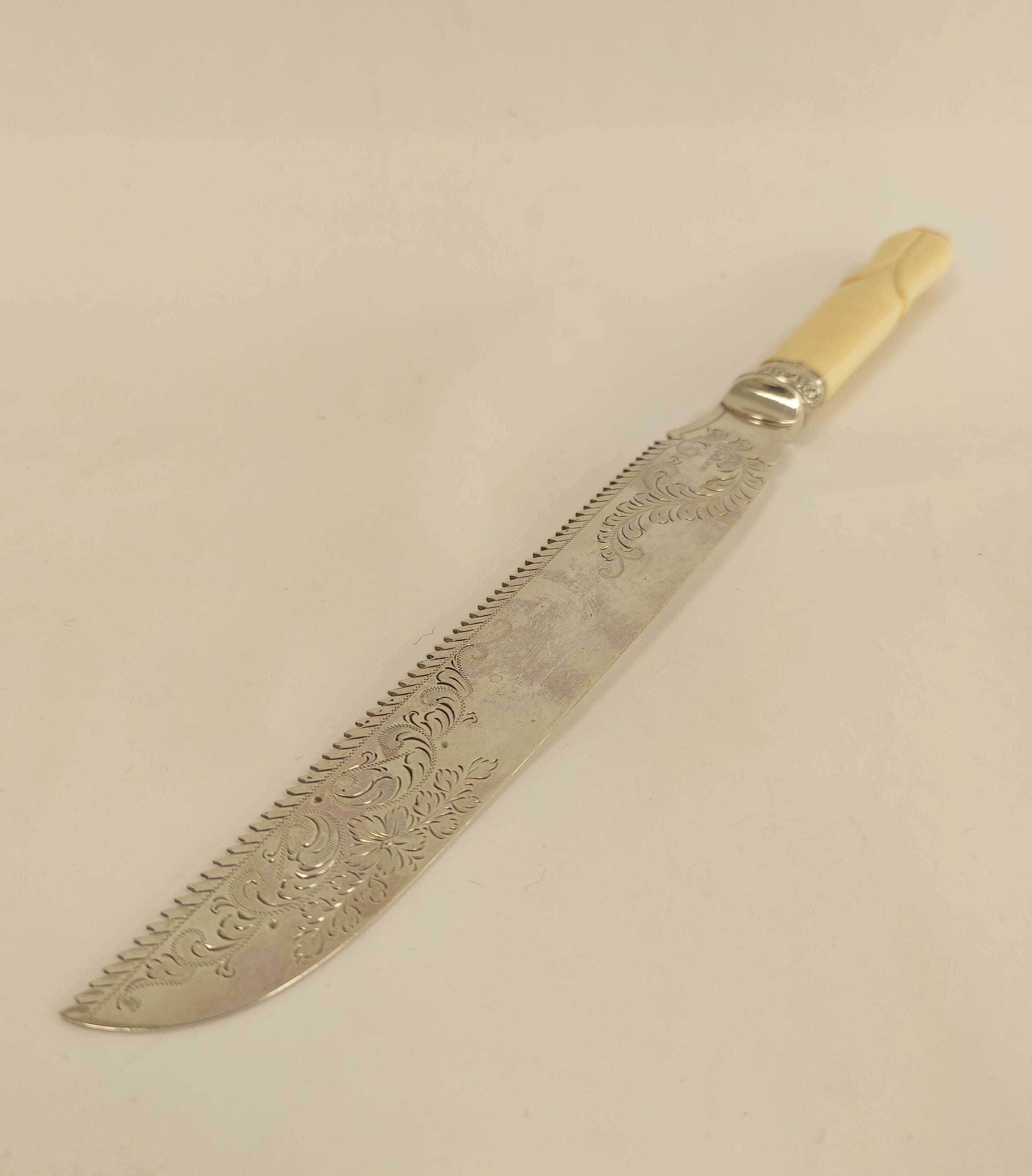 Good e.p. cake knife, engraved with carved ivory handle, the silver ferrule Sheffield 1897, cased. - Image 2 of 5