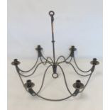 Wrought iron hanging candelabra with six sconces, 66cm diam. and 53cm high.