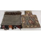 Two Afghan Baluchi salt bags with woven geometric decoration, 50cm and 42cm long.  (2).