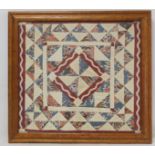 Small Victorian patchwork panel, "Diamond in the Square" pattern, in plain and floral chintzes, 38cm