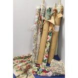 Vintage furnishing textiles: Five rolls of Sanderson printed linen: three with floral decoration