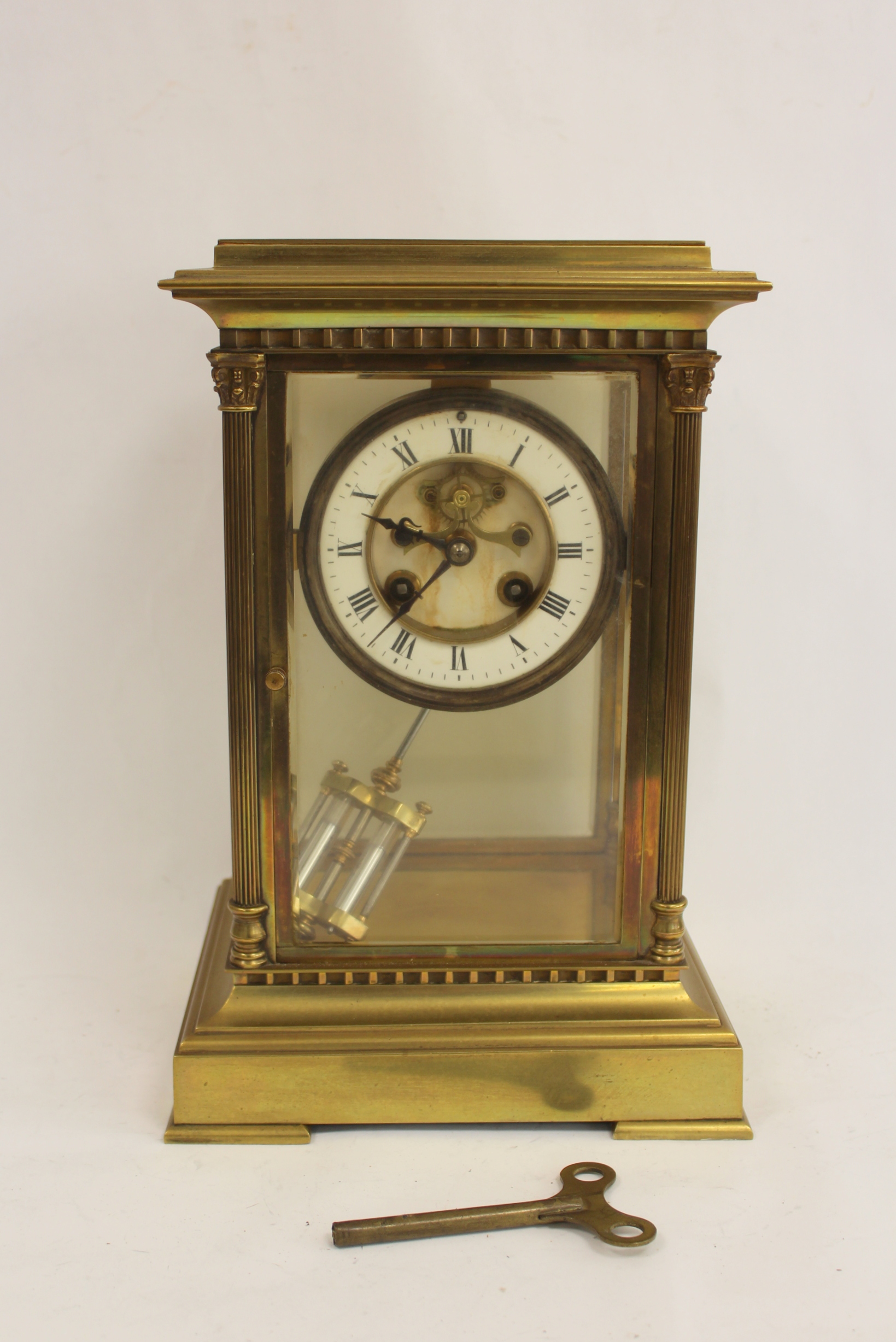 French mantel clock of 'four glass' style with visible escapement, 'mercury' pendulum and fluted