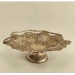 Silver octofoil cake basket, pierced and embossed with flowers, fruit and scrolls, by G. Hutton,