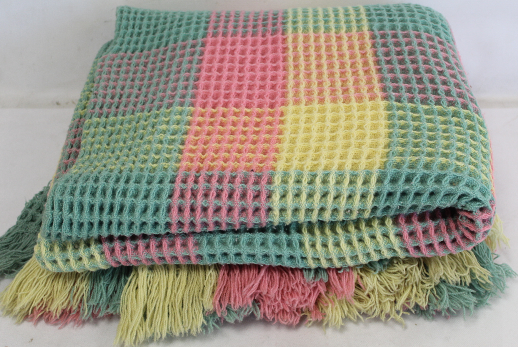Welsh wool waffle blanket woven in pastel pink, yellow and green checks. - Image 2 of 2