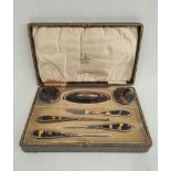 Silver mounted tortoiseshell manicure set in fitted case, Chester 1922, for Grant Castle.