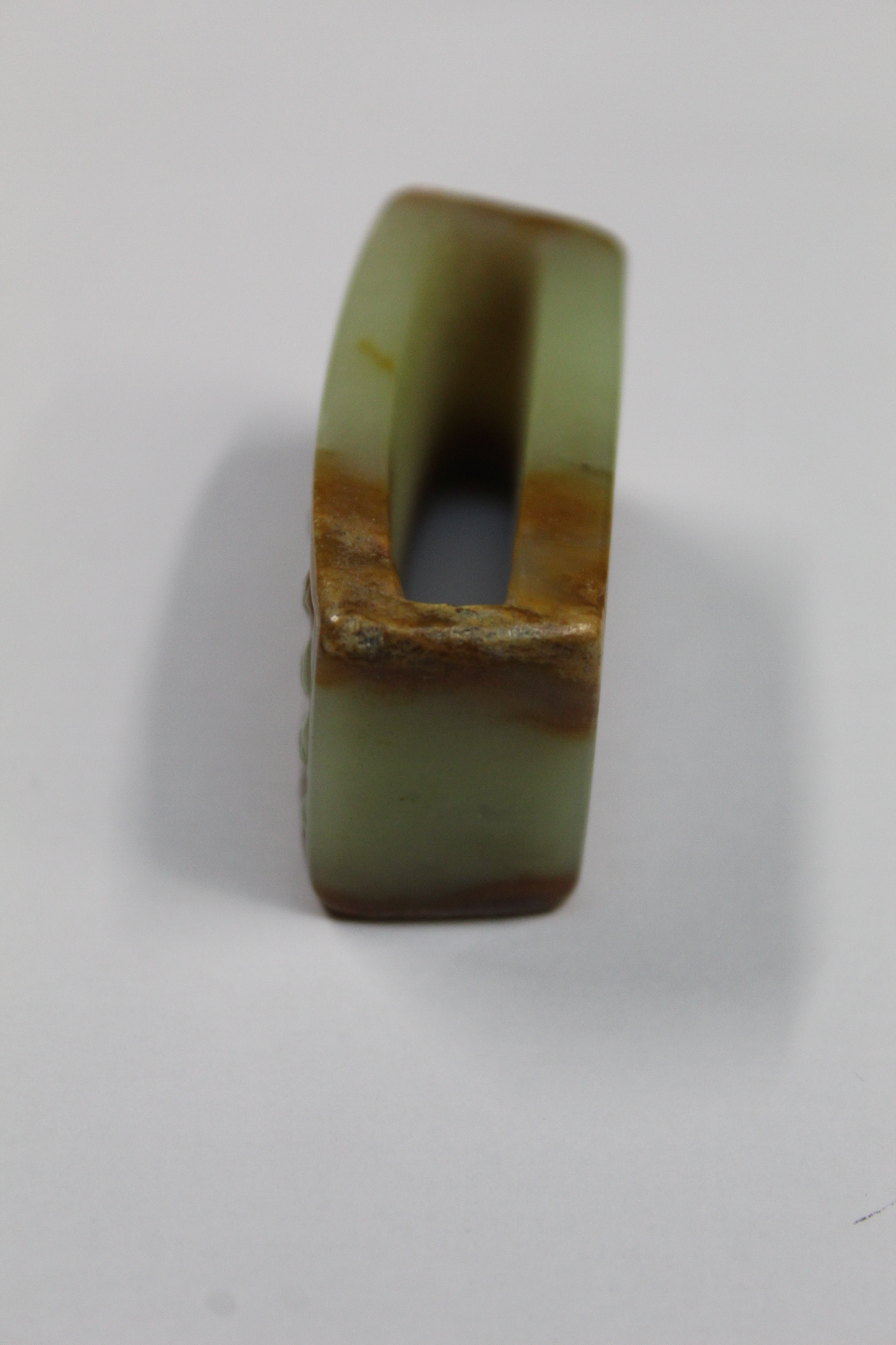 Three Chinese archaic and archaised jade figures to include a repose cat figure, a rectangular - Image 12 of 14