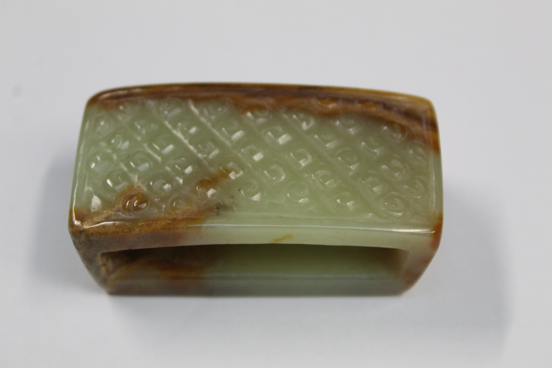 Three Chinese archaic and archaised jade figures to include a repose cat figure, a rectangular - Image 9 of 14