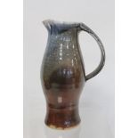 Lisa Hammond London studio pottery jug of baluster form with blue and brown glazes, impressed marks,