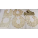 Five Victorian/Edwardian lace collars; also a length of lace trim.  (6).