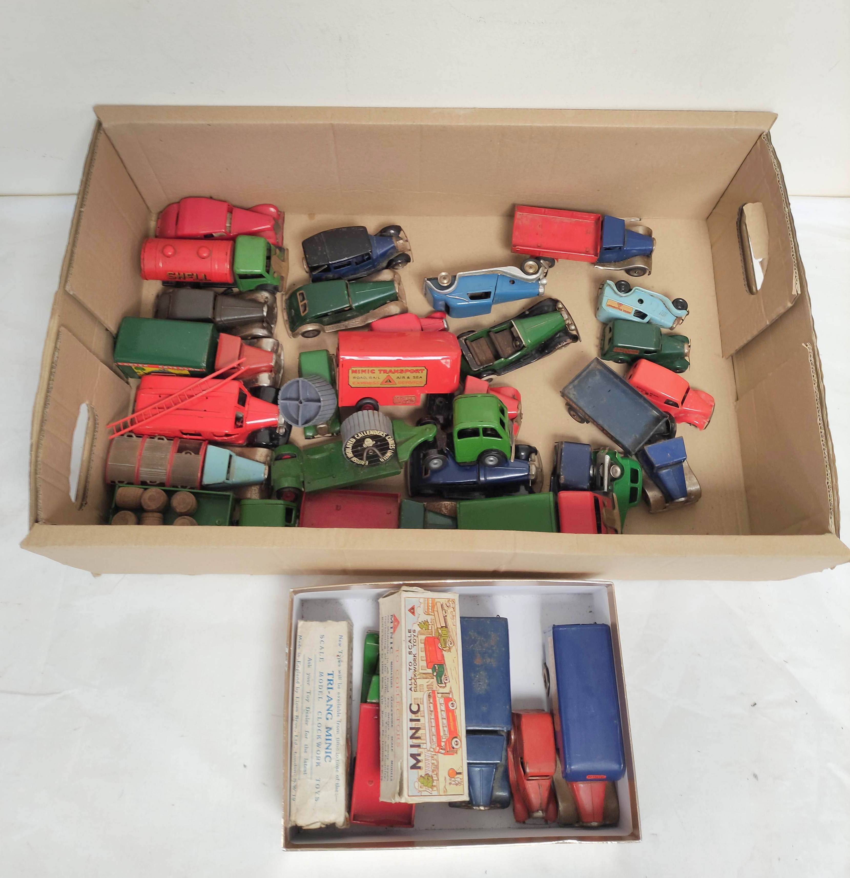 Collection of vintage boxed and loose Tri-ang Minic clockwork vehicles some pre war to include a