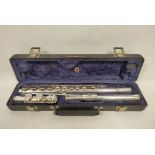 Rudall Carte silver metal flute in case of the same name.