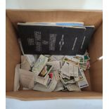 Box containing a large collection of tea, cigarette, and cereal cards to include Reddings Ships of