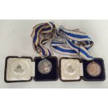 Two boxed Edinburgh Academy silver Dux medals awarded to Charles Kenneth Mackinnon Douglas OBE,