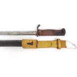 WWI German bayonet, marked CG Haenel, Suhl, with a wood grip, fullered blade and scabbard, 52cm