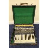 Hohner Carmen II accordion in fitted case.