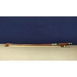 Antique cello bow measuring 72.5cm in length, stamped Butler.