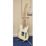 Fender Squier Affinity Telecaster electric guitar in vintage white lacquer finish with stand. Serial