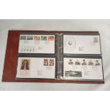 Album of approximately 64 Royal Mail first day cover postage stamp sets dating from the 1980s. All