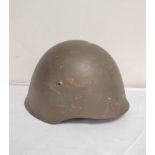Portugese M/940-63 helmet with original liner finished in olive green field paint