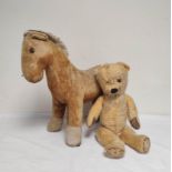 Two antique mohair stuffed toys to include an articulated clockwork teddy & a toy horse by Deans Rag