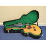 Freshman 12 string electro-acoustic guitar model FA1AM12 with pickups in hard case.