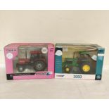 Two boxed 1:32 scale Britains model tractors to include John Deere 3050 42902 & a Case IH 1056XL 2WD