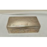 Sterling silver scalloped cigar box by Mappin & Webb. The centre of the box is engraved with the
